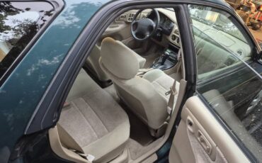 Subaru-impreza-sport-wagon-1996-green-8