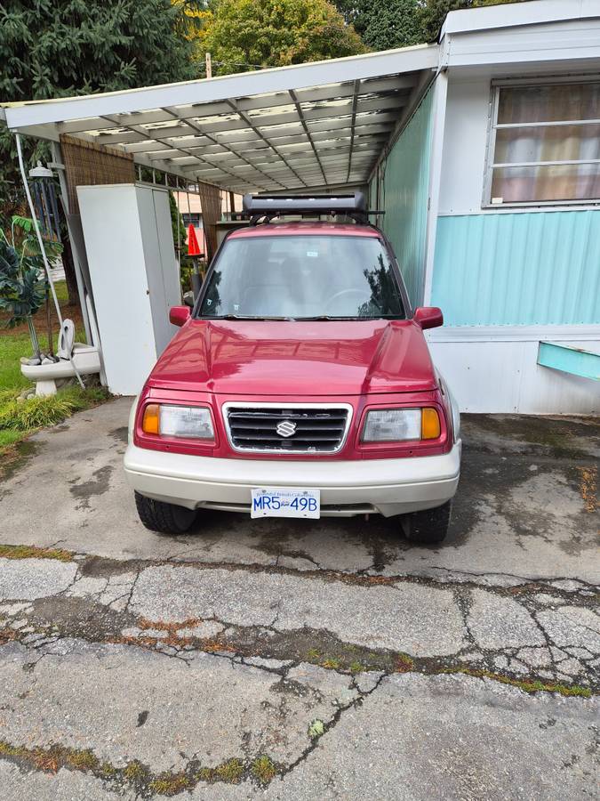 Suzuki-sidekick-sport-jlx-1996-red
