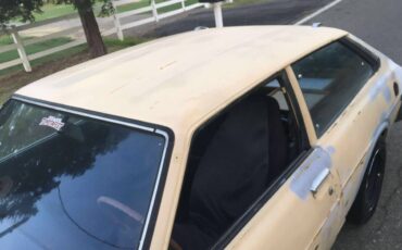 Toyota-corolla-liftback-1977-yellow-12