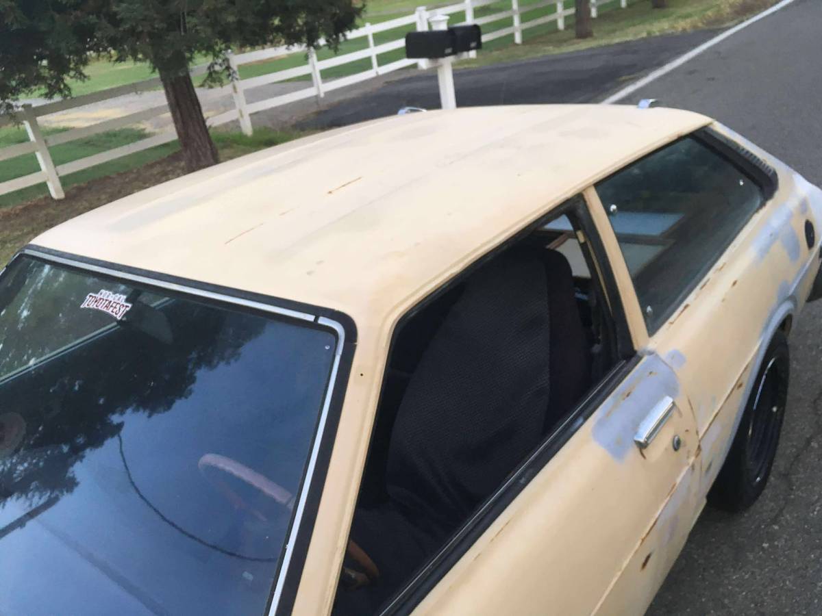 Toyota-corolla-liftback-1977-yellow-12