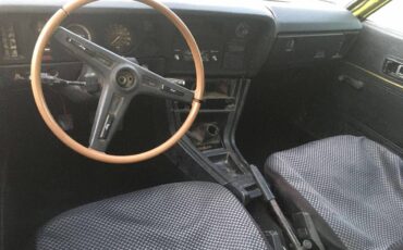 Toyota-corolla-liftback-1977-yellow-4