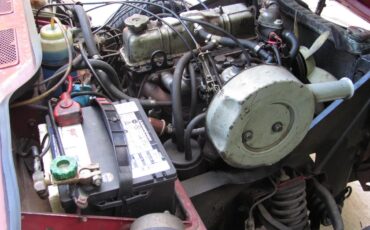 Triumph-Spitfire-1974-Carmine-Red-Tan-2