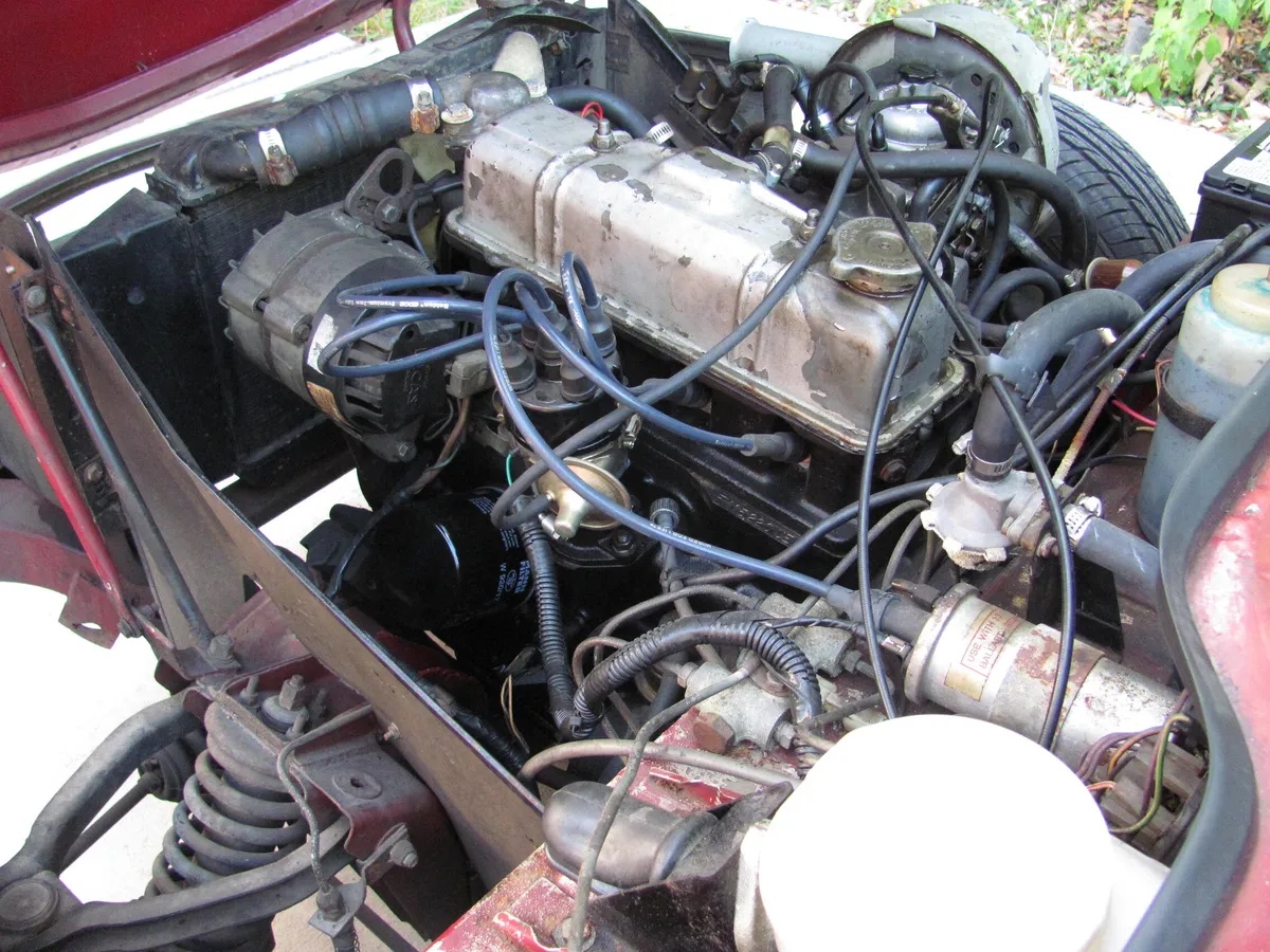 Triumph-Spitfire-1974-Carmine-Red-Tan-3