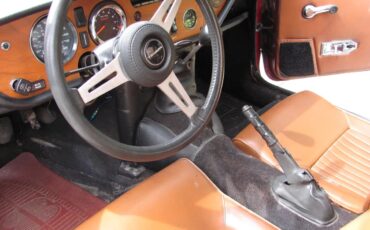 Triumph-Spitfire-1974-Carmine-Red-Tan