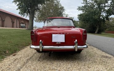 Triumph-Tr4-1965-Signal-Red-Black-With-White-Piping-Leather