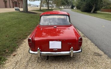 Triumph-Tr4-1965-Signal-Red-Black-With-White-Piping-Leather-7