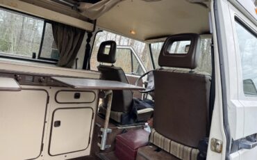 Volkswagen-Vanagon-1984-White-With-Black-Stripe-Joker-Seats-Tan-Interior-Bed-13