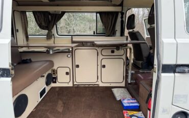Volkswagen-Vanagon-1984-White-With-Black-Stripe-Joker-Seats-Tan-Interior-Bed-9