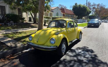 Volkswagen-super-beetle-1974-yellow-1