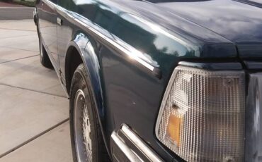 Volvo-240-1993-green-6