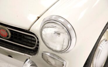 Austin-healey-Sprite-1966-Old-English-White-Black-25