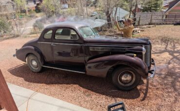 Buick-40-1938-Maroon-Beige-1