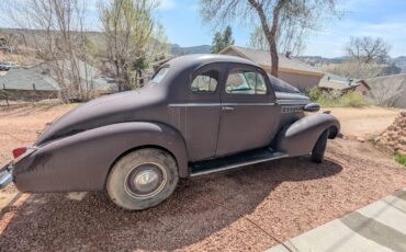 Buick-40-1938-Maroon-Beige-13