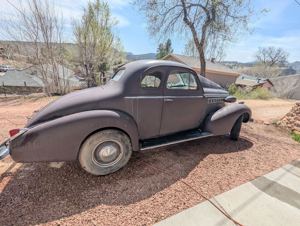 Buick-40-1938-Maroon-Beige-13