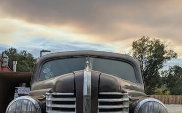 Buick-40-1938-Maroon-Beige