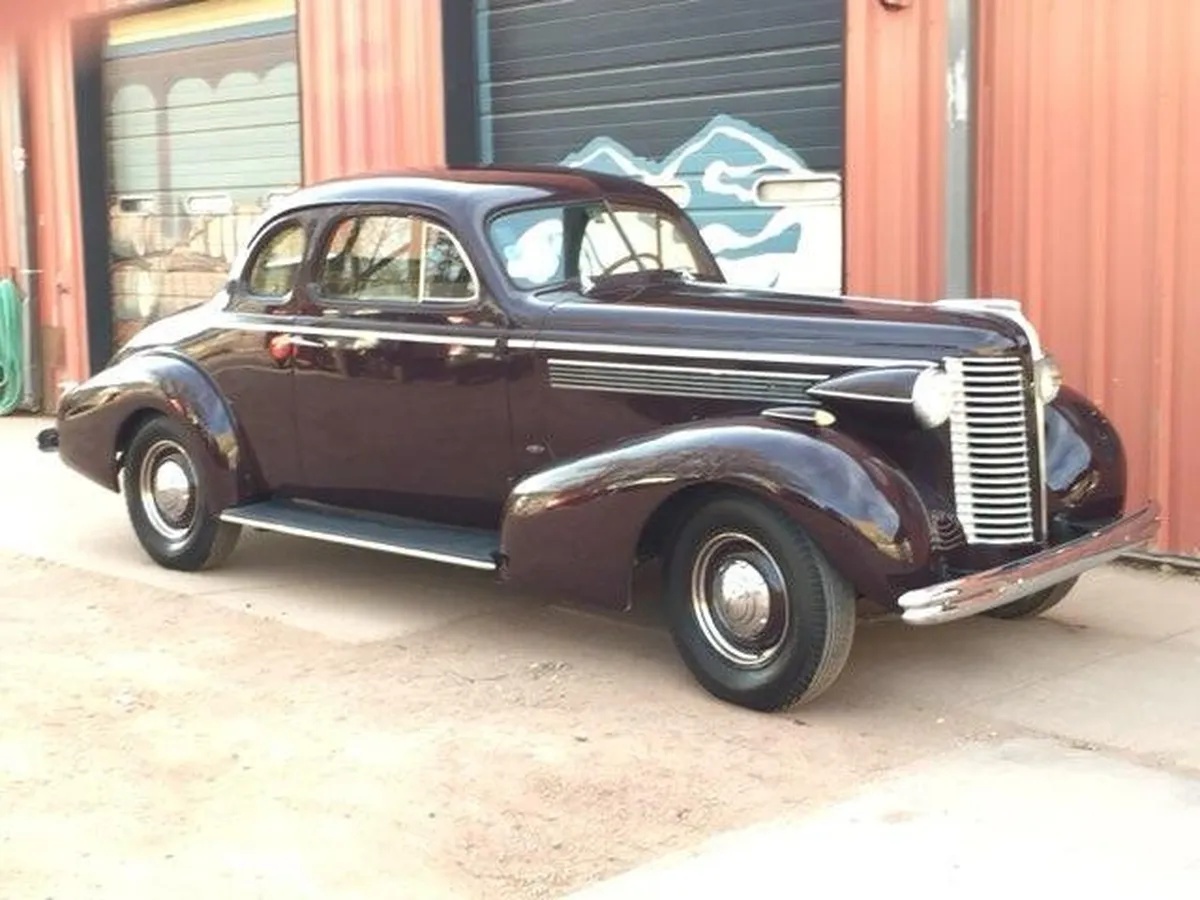 Buick-40-1938-Maroon-Beige-4