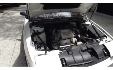 Buick-Reatta-1990-White-Red-10