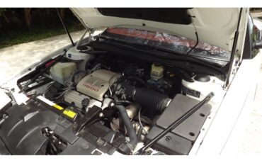 Buick-Reatta-1990-White-Red-12