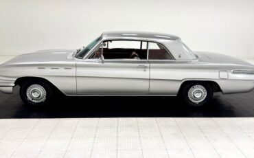 Buick-Skylark-1962-Silver-Cloud-Red