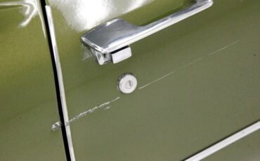 Cadillac-Coupe-deville-1970-Bayberry-Metallic-Gold-6