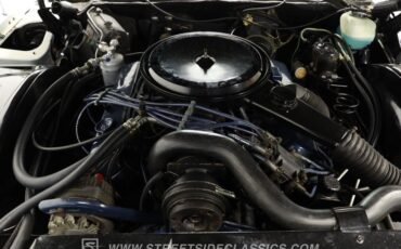 Cadillac-Eldorado-1976-Cotillion-White-Dark-Firethorn-1