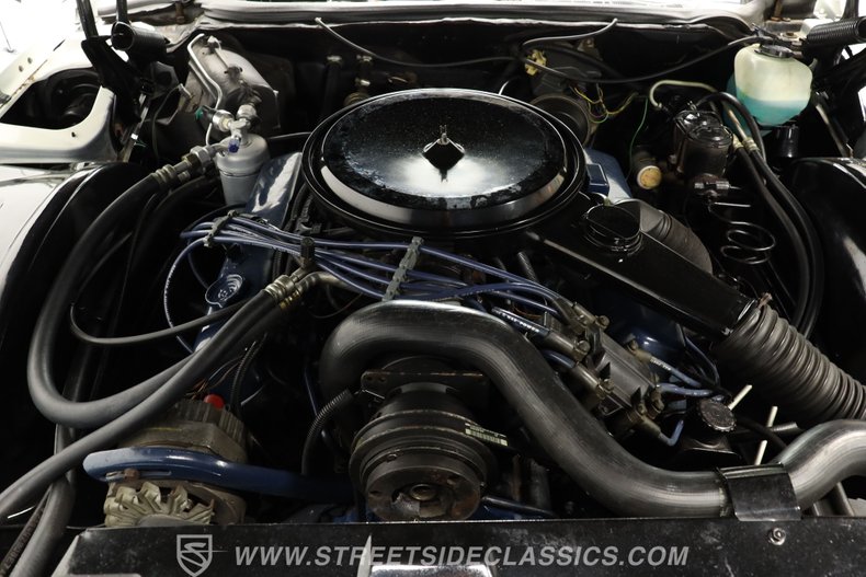 Cadillac-Eldorado-1976-Cotillion-White-Dark-Firethorn-1