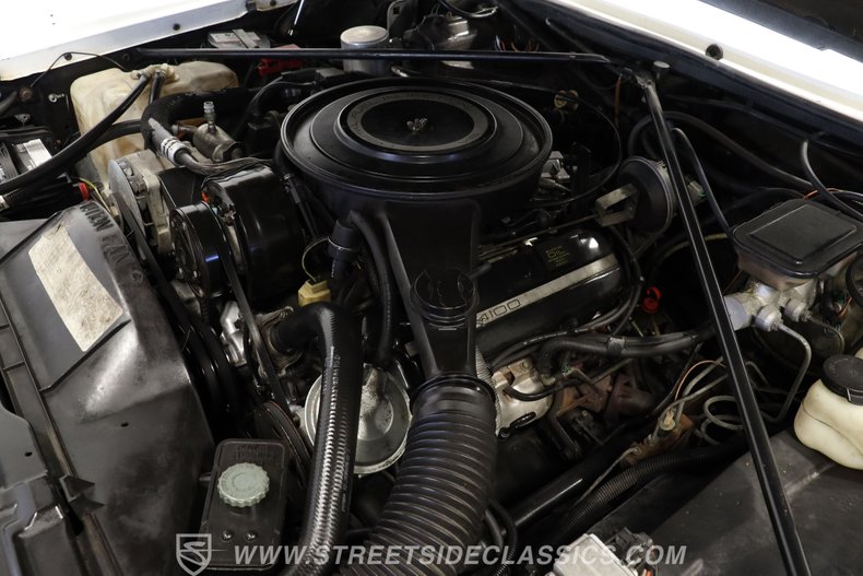 Cadillac-Eldorado-1984-White-Dark-Carmine-Red-24