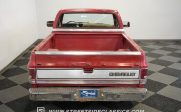 Chevrolet-C10-1987-Apple-Red-Doe-Skin-Tan-32