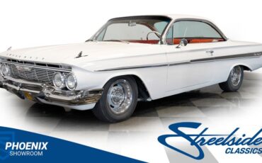 Chevrolet-Impala-1961-Ermine-White-Red
