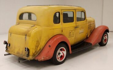Chevrolet-Master-1934-Yellow-Burgundy-17