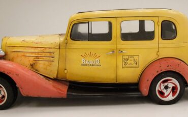 Chevrolet-Master-1934-Yellow-Burgundy