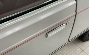 Chrysler-Lebaron-1985-Bright-Silver-Metall-Oxblood-1