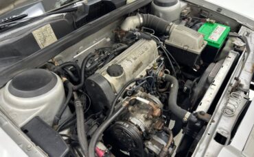 Chrysler-Lebaron-1985-Bright-Silver-Metall-Oxblood-12