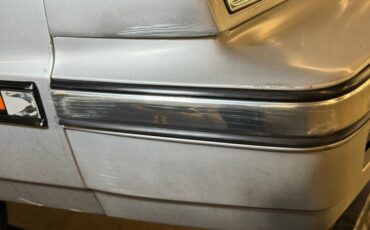 Chrysler-Lebaron-1985-Bright-Silver-Metall-Oxblood-9