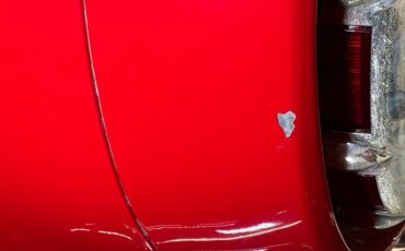 Ford-Thunderbird-1957-Flame-Red-Saddle-31