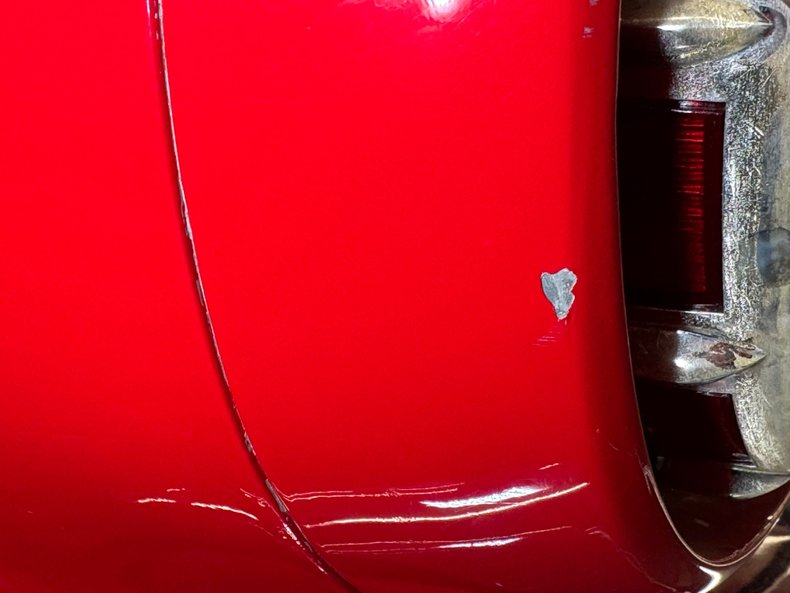 Ford-Thunderbird-1957-Flame-Red-Saddle-31