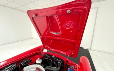 Ford-Thunderbird-1957-Flame-Red-Saddle-32