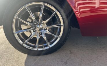 Ford-Thunderbird-1957-Kandy-Apple-Red-Gold-flake-Red-and-white-quilted-52