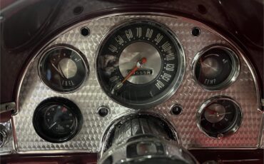 Ford-Thunderbird-1957-Kandy-Apple-Red-Gold-flake-Red-and-white-quilted-9