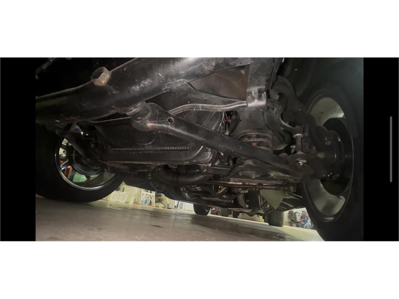 Ford-Thunderbird-1957-Kandy-Apple-Red-Gold-flake-Red-and-white-quilted-92