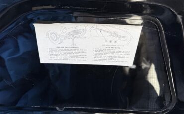 Ford-Thunderbird-1957-Raven-black-Back-and-white-2-tin-14