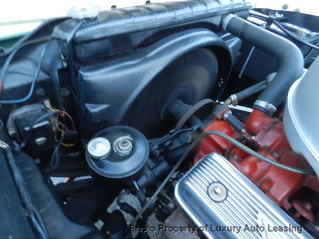 Ford-fairlane-sunliner-1957-green-3