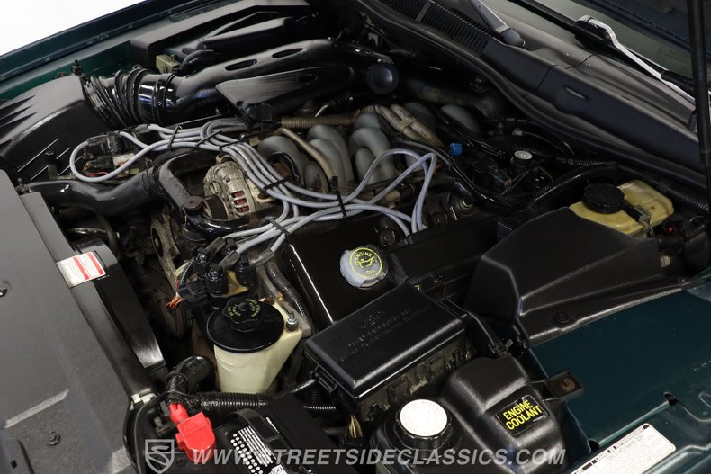 Lincoln-Mark-viii-1993-Deep-Jewel-Green-Tan-32