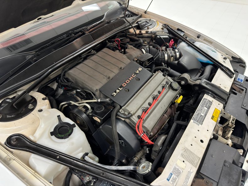 Oldsmobile-Cutlass-supreme-1994-White-Burgundy-34