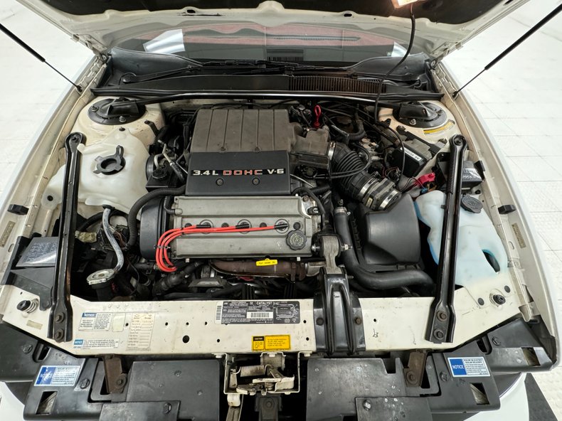 Oldsmobile-Cutlass-supreme-1994-White-Burgundy-35