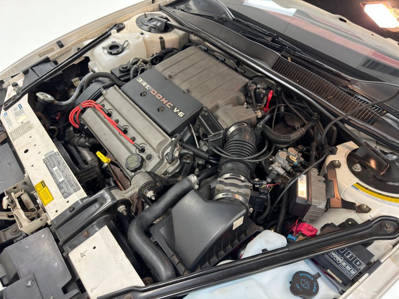 Oldsmobile-Cutlass-supreme-1994-White-Burgundy-36