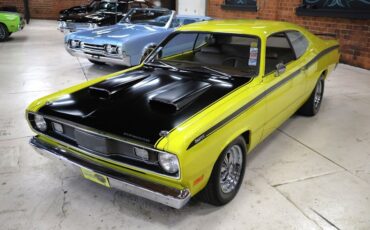 Plymouth-Duster-1971-Curious-Yellow-Tan