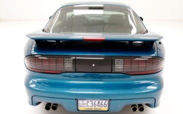 Pontiac-Firebird-1995-Medium-Teal-Blue-Met-Beige-2