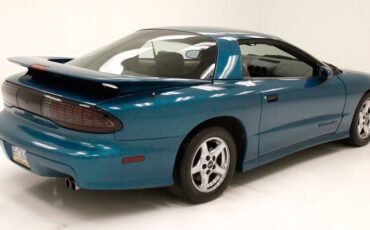 Pontiac-Firebird-1995-Medium-Teal-Blue-Met-Beige-3