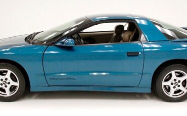 Pontiac-Firebird-1995-Medium-Teal-Blue-Met-Beige